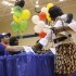 Congratulations are in order: Assistant Principal Valorie Mason shakes hands with senior Cole Barbe after his signing with Houston Baptist University. Photo by Dairyn Salguero