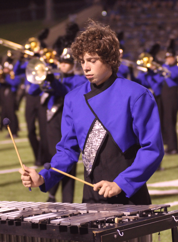 Half time concentration: During the halftime show,
sophomore Josh Meyer plays the marimba. Photo by:
Jenna Moreland