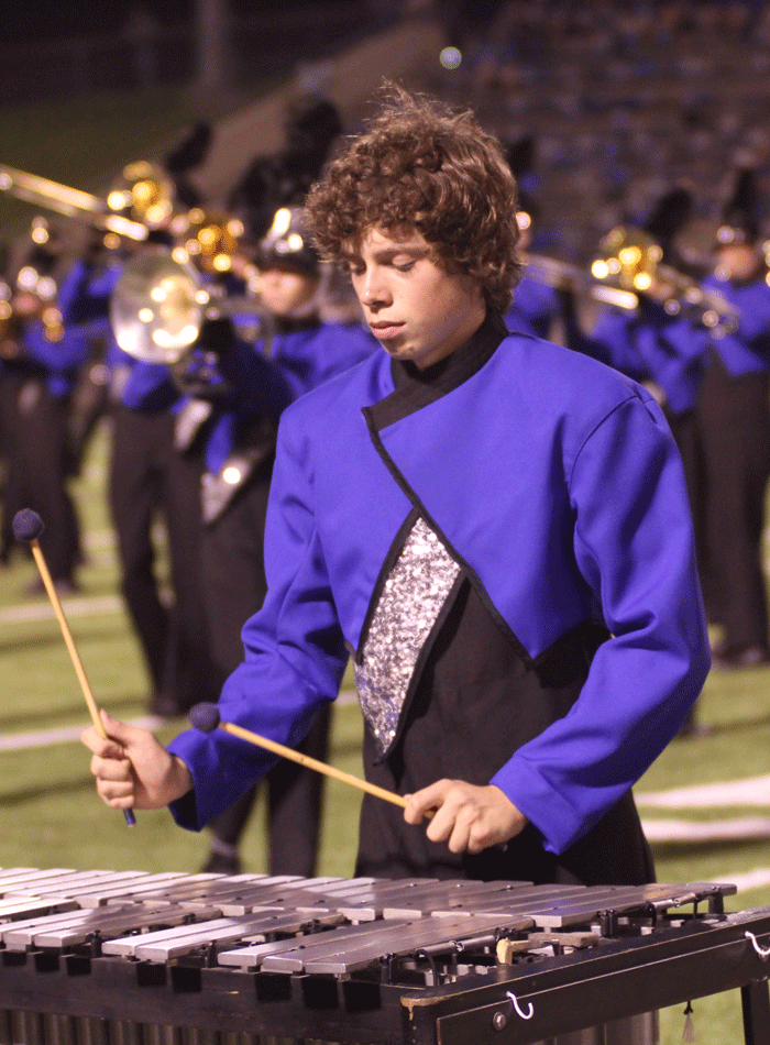 Half time concentration: During the halftime show,
sophomore Josh Meyer plays the marimba. Photo by:
Jenna Moreland