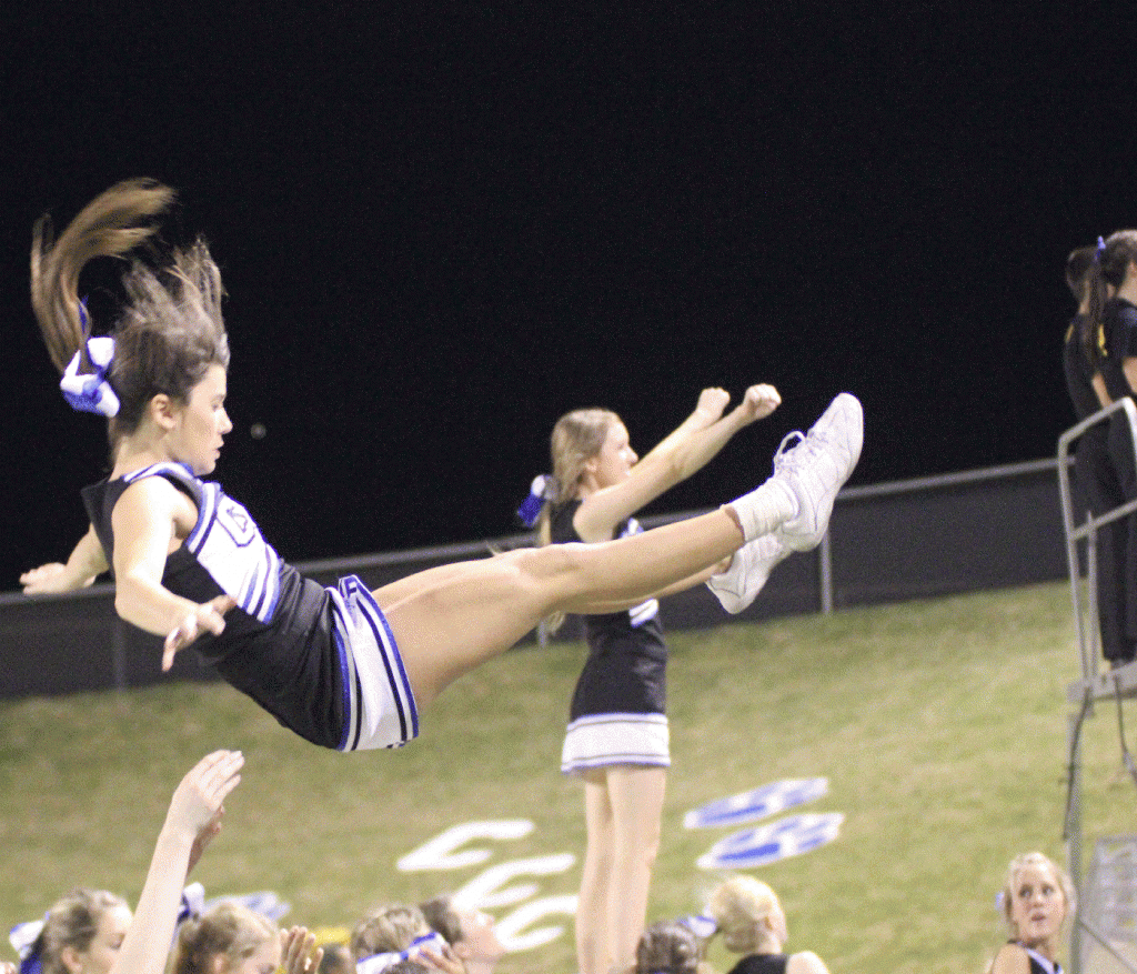 Brooke Gassiott flies through the air during the Cy Creek vs Cy Woods football game on Nov. 2