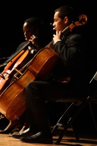 Bows and Strings: Marquecho played Coldplay on his cello for the talent portion of the pageant. Photo thanks to yearbook staff.