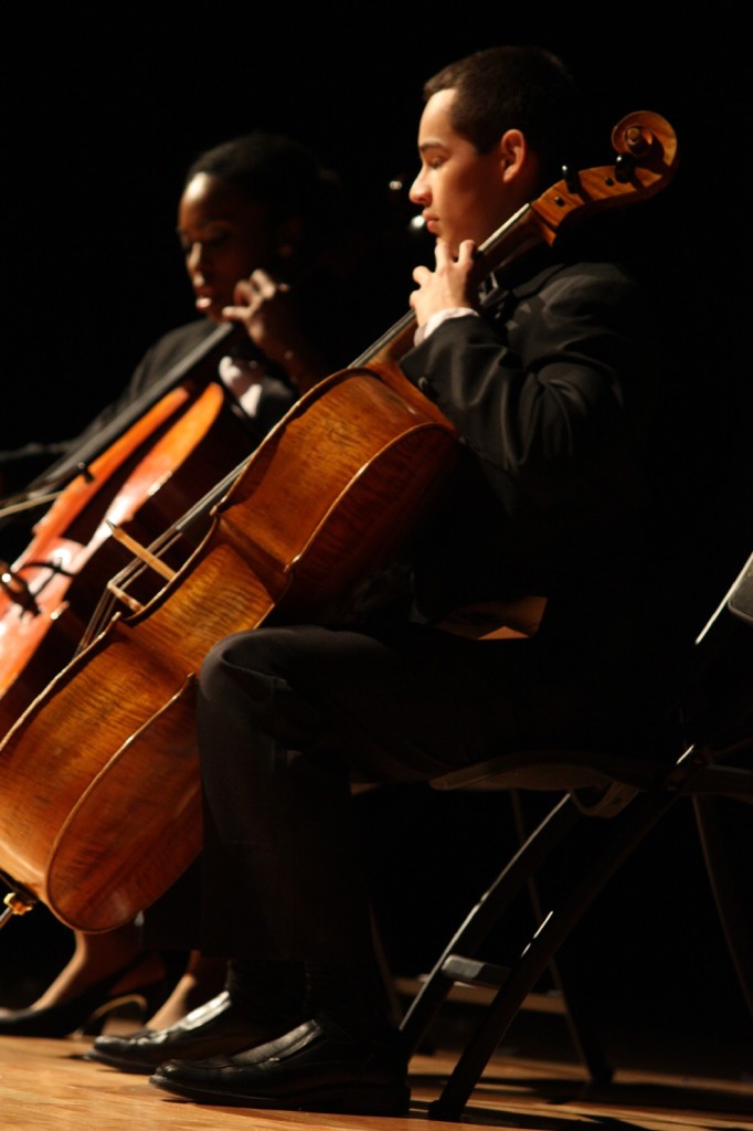Bows and Strings: Marquecho played Coldplay on his cello for the talent portion of the pageant. Photo thanks to yearbook staff. 
