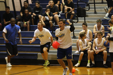 Coaches Ryan Tatum and Jarrett Shipman cheering on their team.