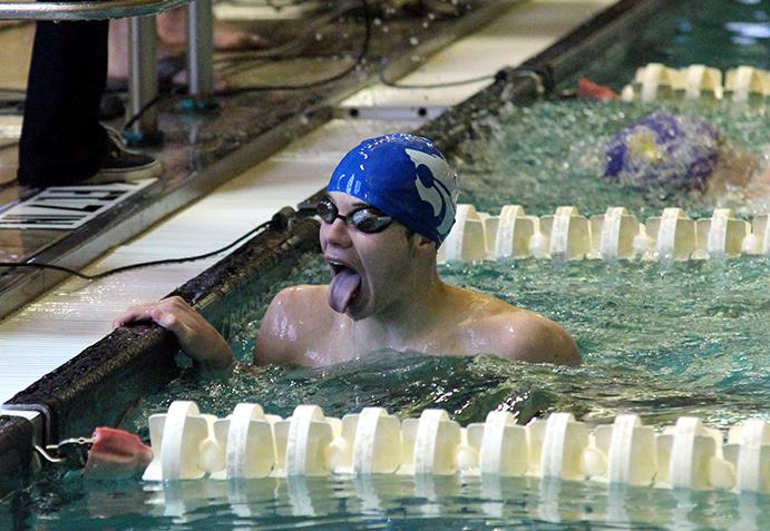 Junior Braxton Flowers after winning first in the 100m backstroke. 