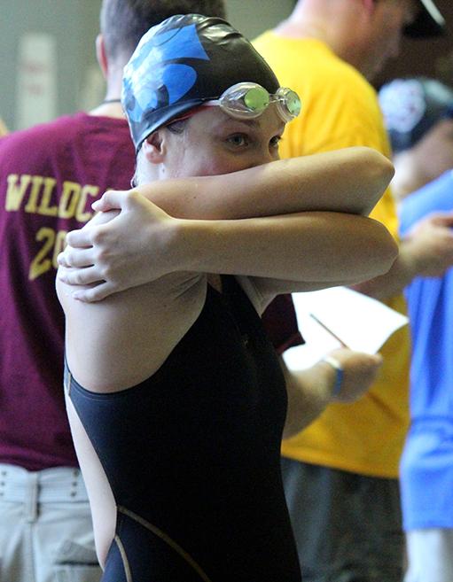 Freshman Alyssa Khol prepares to swim her event.