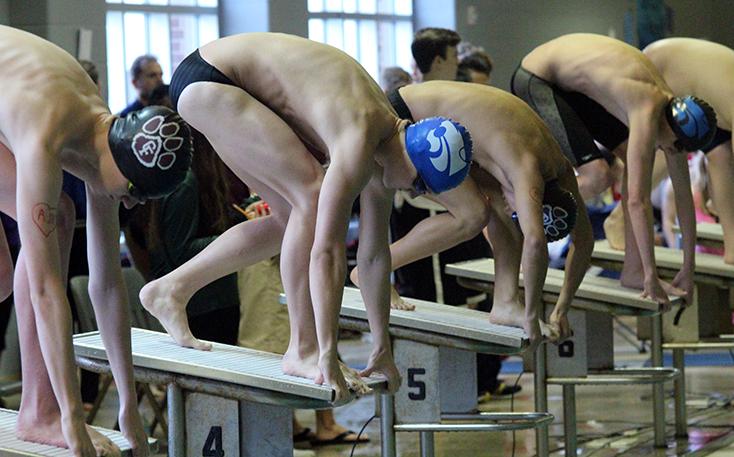 Sophomore Riley OHara before swimming his event.