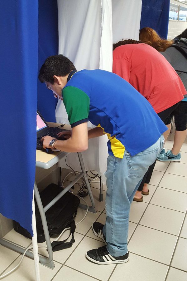 Students participate in the presidential mock election