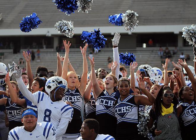 Cheerleaders, football players and Silvies celebrate a final victory for the season.