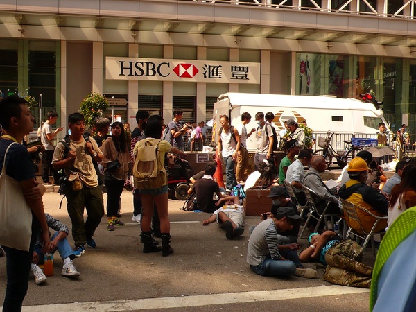 "P1240696 protesters in MongKog, HONGKONG, 17-10-2014" by K.rol2007 is marked with CC PDM 1.0
