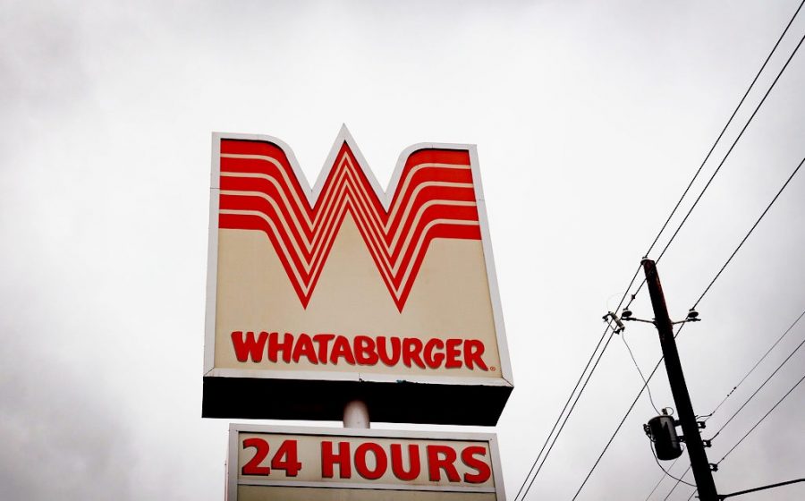 A sign for a Whataburger fast food restaurant in Nacogdoches, Texas.