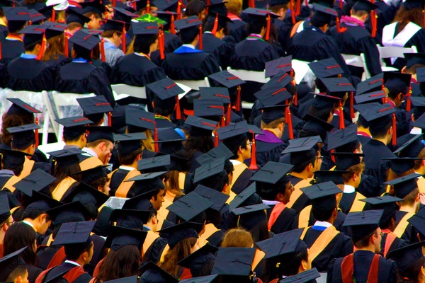 A floor of graduation caps by TracerBullet999 is licensed under CC BY-NC 2.0