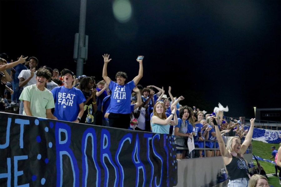 The+student+section+celebrates+at+the+Oct.+8+Varsity+football+game+against+Cy-Fair.+Photo+by+Brianna+Jimenez.