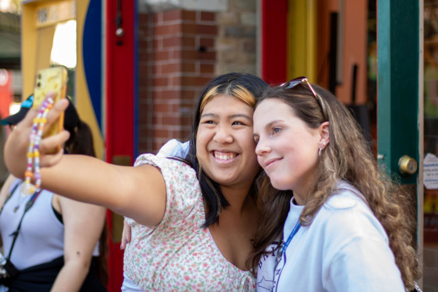 Senior Anisa Tran and Bridgeland junior Carolyn Gilbert take a BeReal near Alamo Plaza Oct. 9 while attending Fall Fiesta in San Antonio.