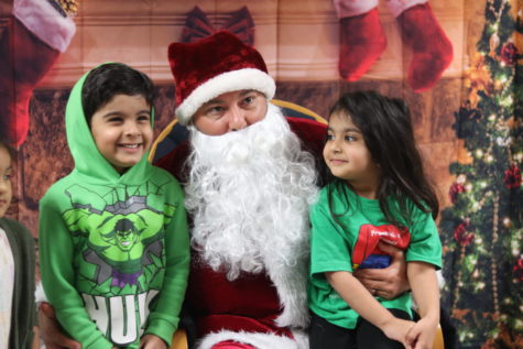 Mr. Lally dresses up as Santa Claus for the preschool students on Dec. 8, 2022. Photo by Crystal Gooding.